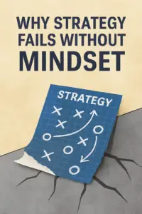 Featured image for article titled ‘Why Strategy Fails Without Mindset.’ A blueprint‑style strategy plan with X’s, circles, and arrows lies on a cracked surface, symbolizing how even the best plans collapse without the right mindset. Bold navy title text appears above on a warm beige background.